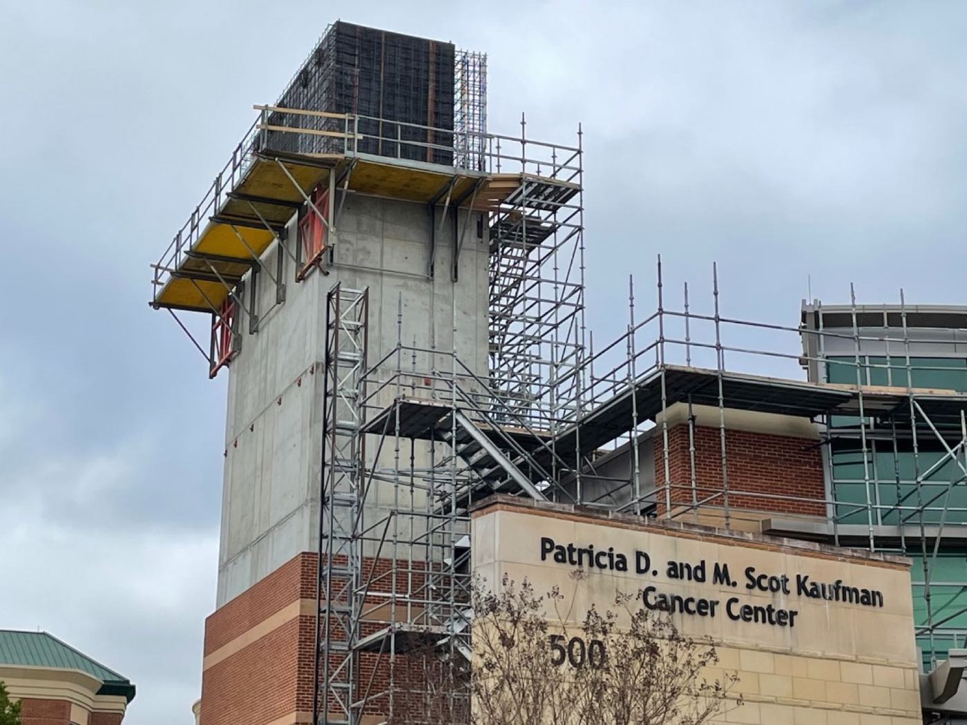 Large institutional concrete structure under construction