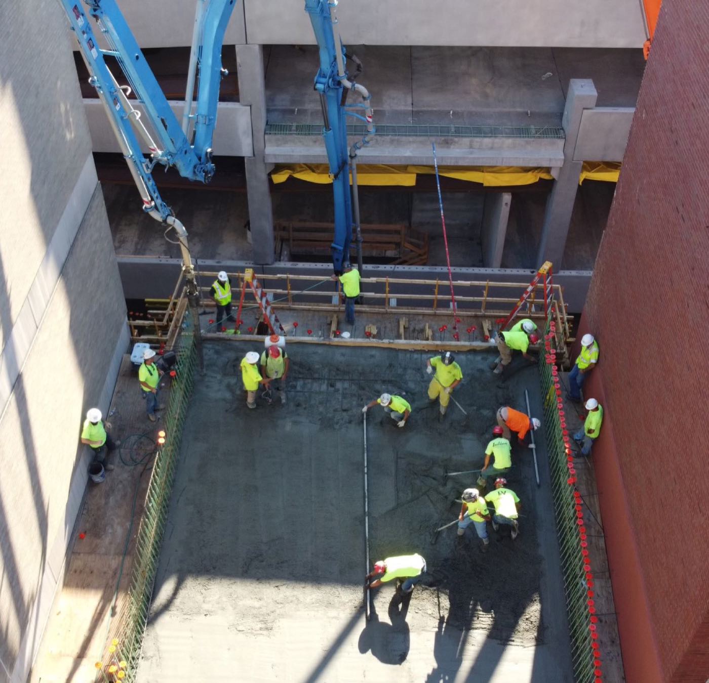 Concrete crew working together on an active pour
